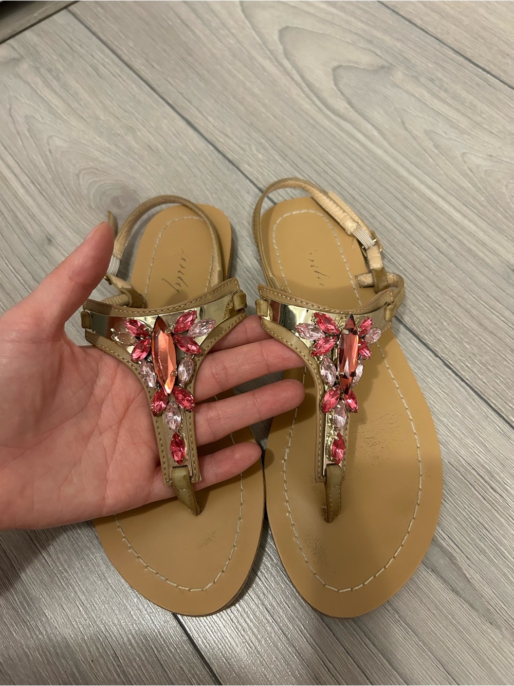 Gold T-Strap Sandals with Pink Gem Embellishment